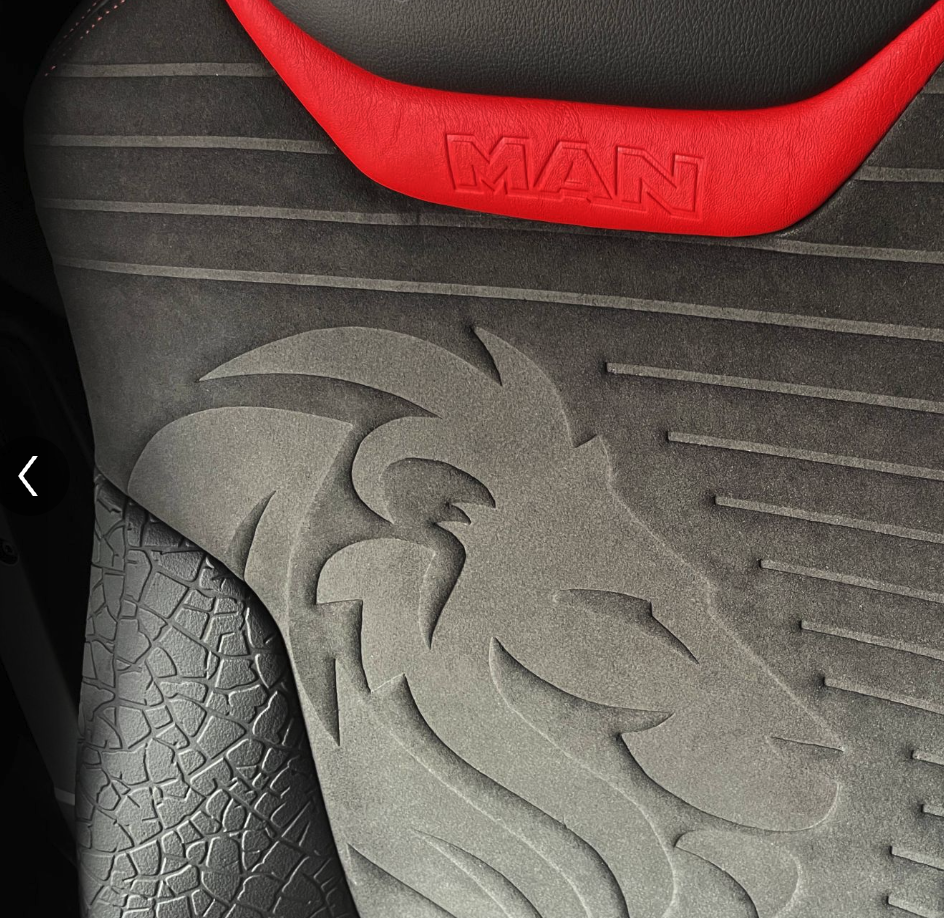 MAN Lion — embossed lion relief on alcantara seat