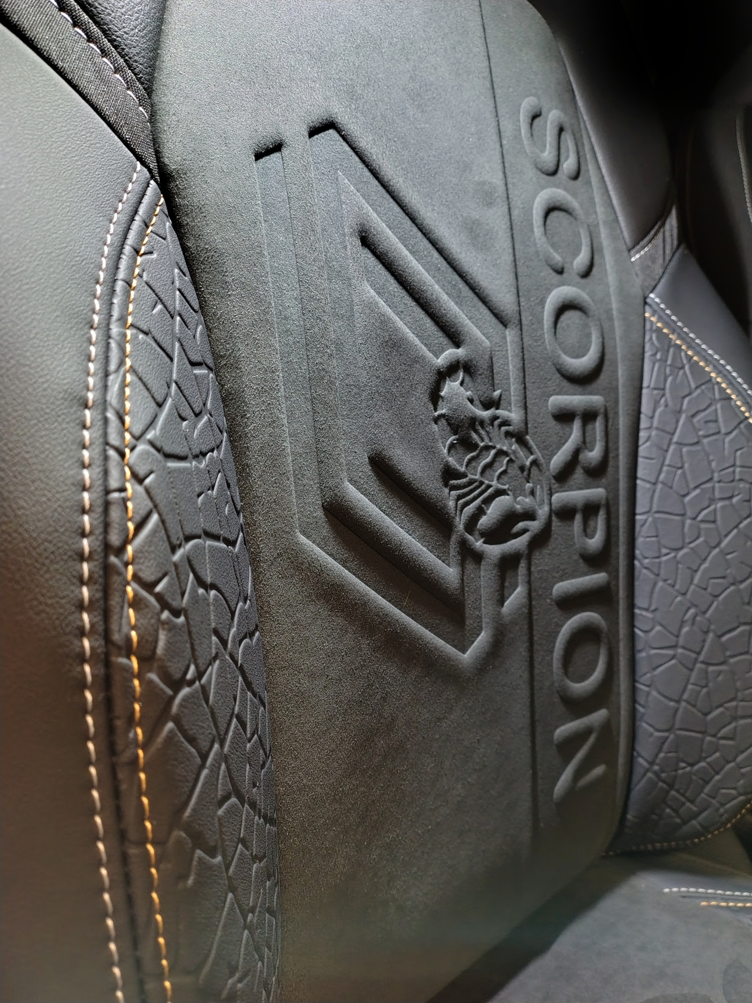 Scorpion Seat — embossed alcantara relief